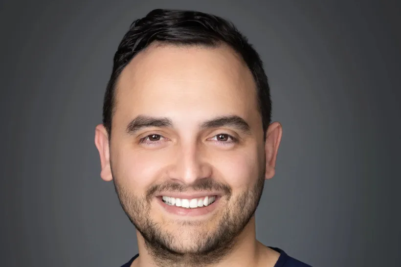 Close-up of bearded man smiling