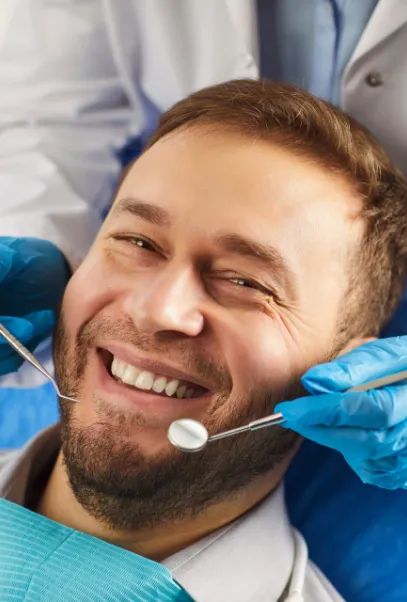 Man smiling during dental checkup